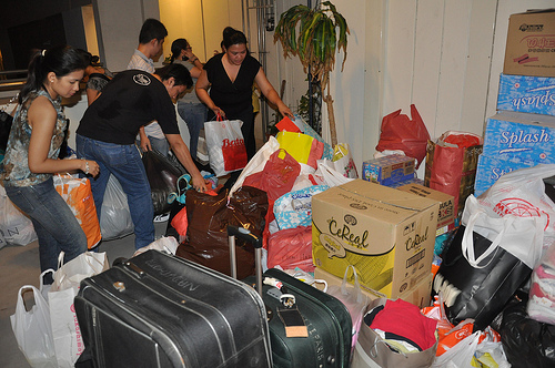 Ondoy Volunteers 01 UPAAS volunteers packs relief goods for ondoy victims.